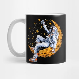 Astronaut sitting on the crescent moon Mug